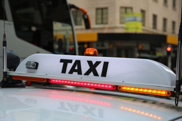 Taxi teken in Sydney op de auto